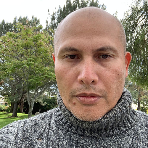 man with shaved head