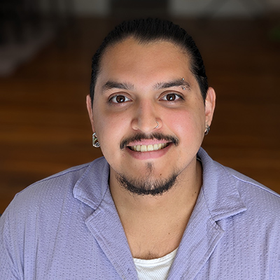 man with goatee smiling