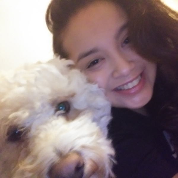 woman smiling with dog