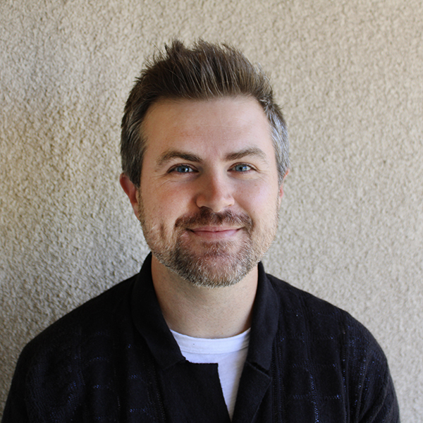 man smiling with beard