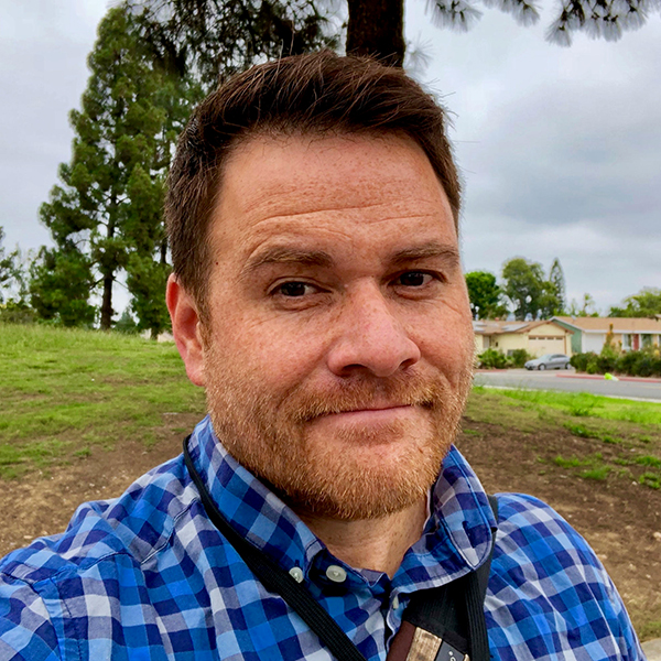 man smiling with beard