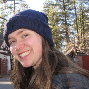 smiling woman wearing beanie