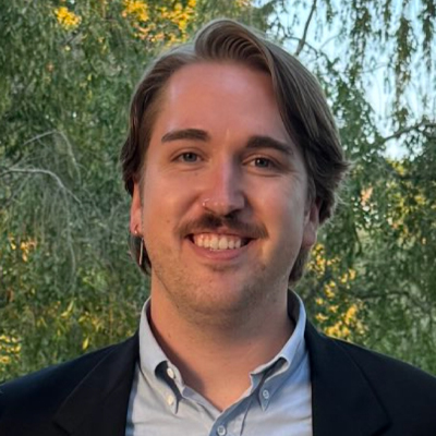 man with mustache smiling